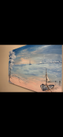 Magi vid stranden